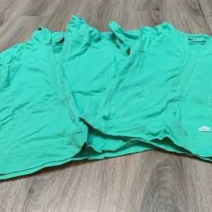 Two green matching Nike hoodies different sizes. XL and L